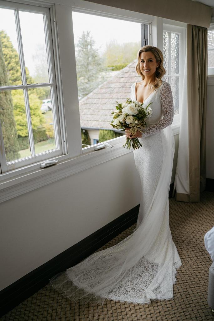 Real bride Hayley wore the Wild Hearts Valencia wedding dress by Karen Willis Holmes.