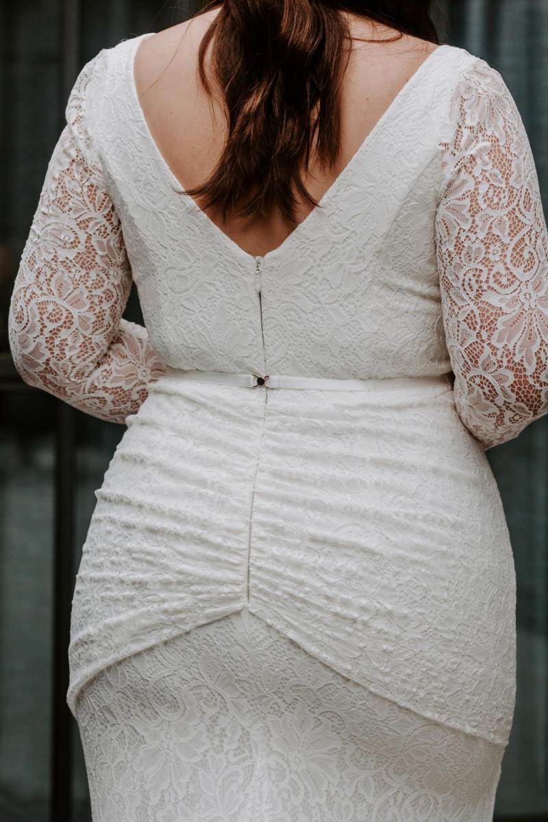 The Valencia Curve gown by Karen Willis Holmes, nontraditional plus size lace wedding dress with long sleeves.