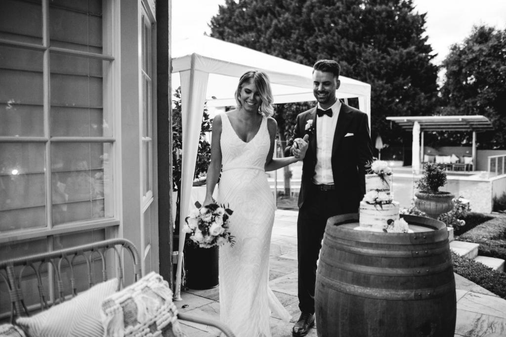 Real bride Kayla wore the Luxe Whitney wedding dress by Karen Willis Holmes.
