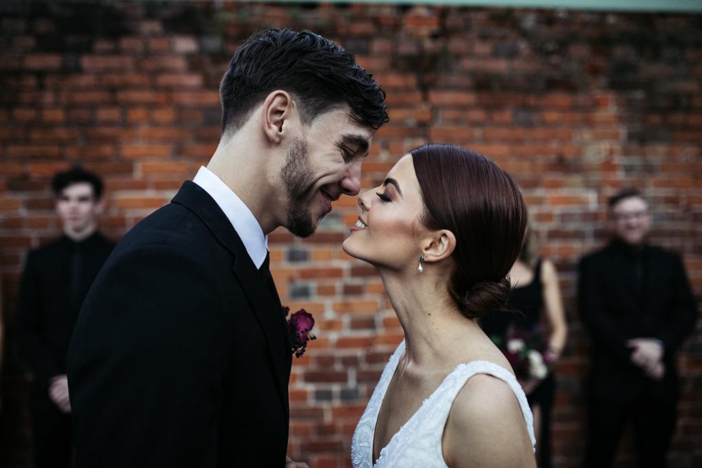 Real bride Victoria wore the Luxe Whitney wedding dress by Karen Willis Holmes.