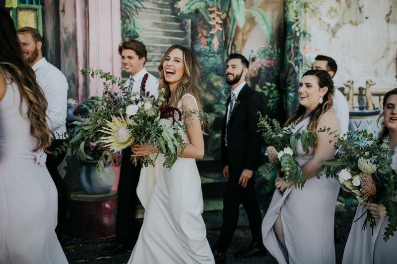Read all about our real bride's wedding in this blog. She wore the Wild Hearts Aubrey wedding dress by Karen Willis Holmes.