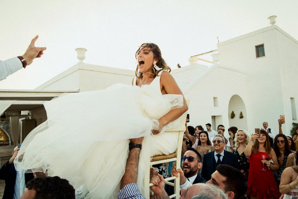 Real bride Lucia wore the Bespoke Rosaline/Marina wedding dress by Karen Willis Holmes.