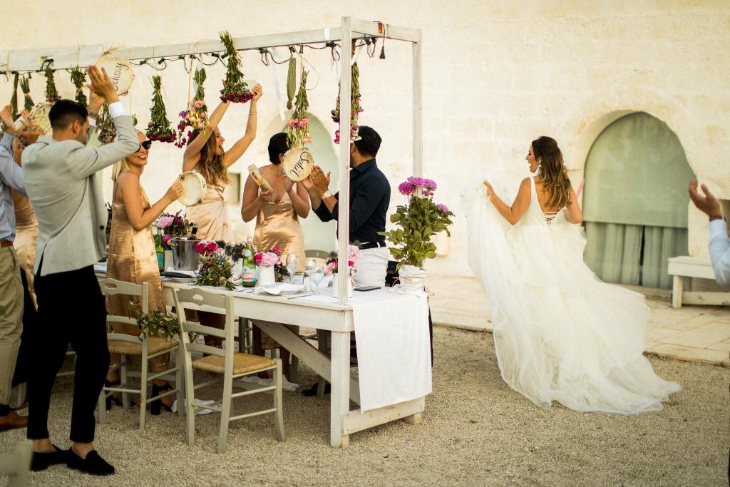 Real bride Lucia wore the Bespoke Rosaline/Marina wedding dress by Karen Willis Holmes.