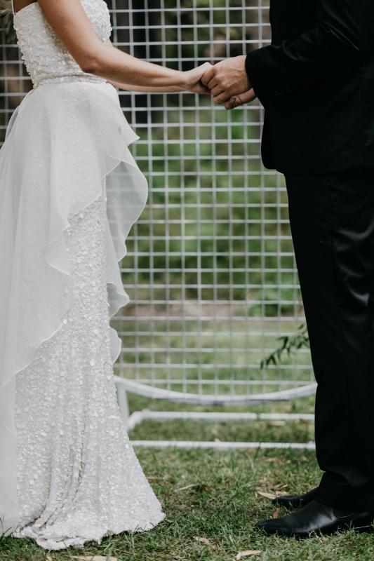 Real bride Tegan wore the Luxe Anya wedding dress by Karen Willis Holmes.