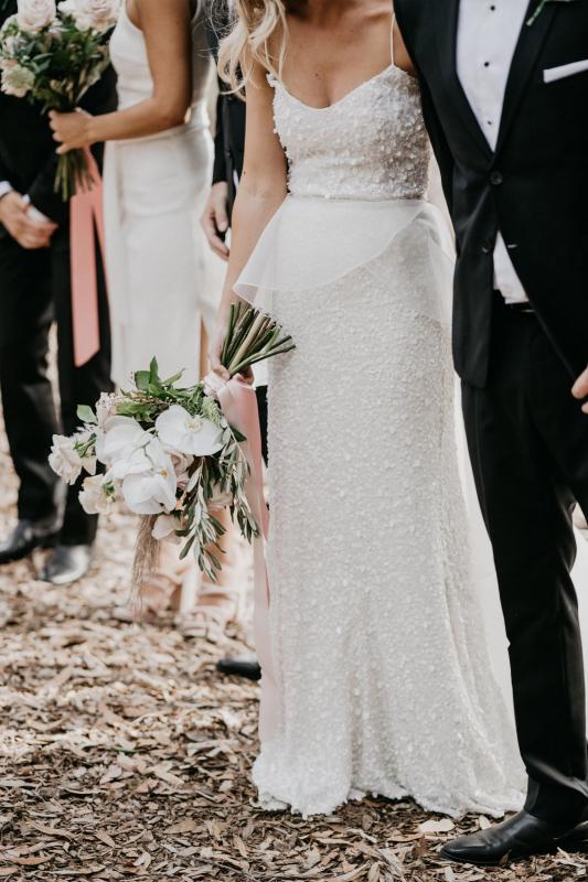 Real bride Tegan wore the Luxe Anya wedding dress by Karen Willis Holmes.