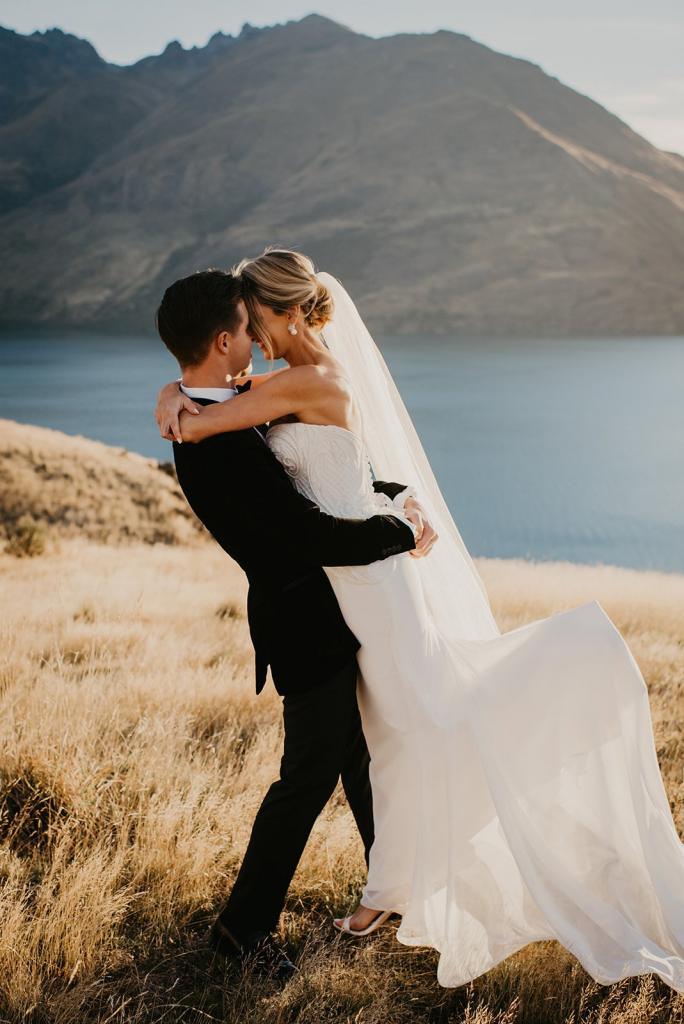 Real bride Cass wore the Bespoke Jessamine wedding dress by Karen Willis Holmes.