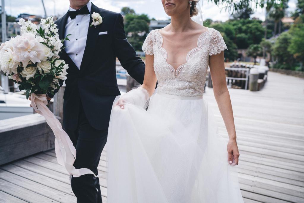 Real bride Eliza wore the Bespoke Rosemary wedding dress by Karen Willis Holmes.