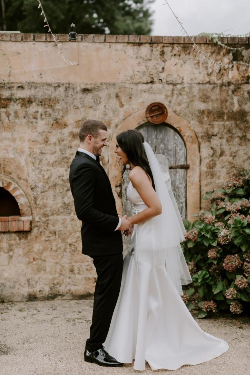 Real bride Bianca wore the Bespoke Jessie/Catriona wedding dress by Karen Willis Holmes.