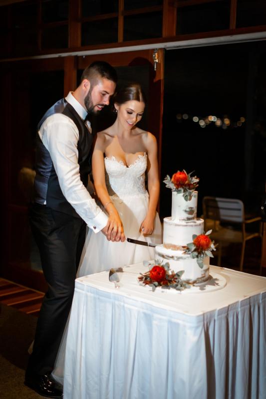 Real bride Murphy wore the Bespoke Selena wedding dress by Karen Willis Holmes.