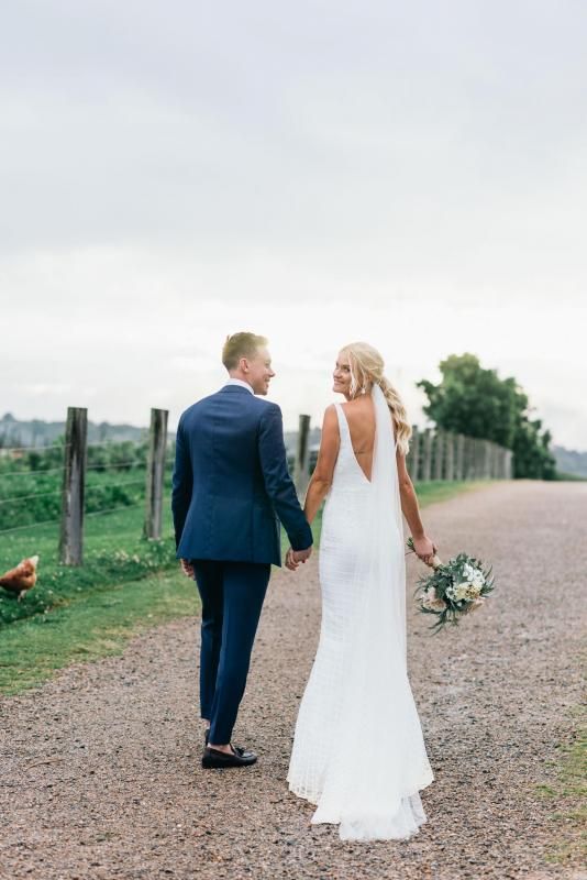 Real bride Melia wore the Wild Hearts Bobby wedding dress by Karen Willis Holmes.