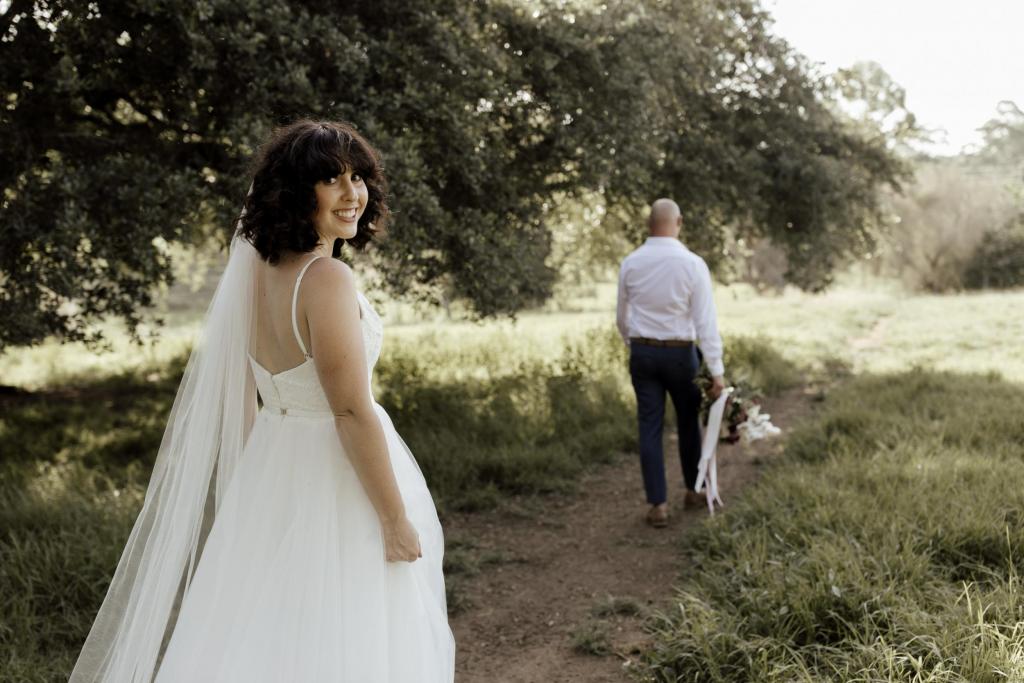 Real bride Lauren wore the Wild Hearts Maisie wedding dress by Karen Willis Holmes.