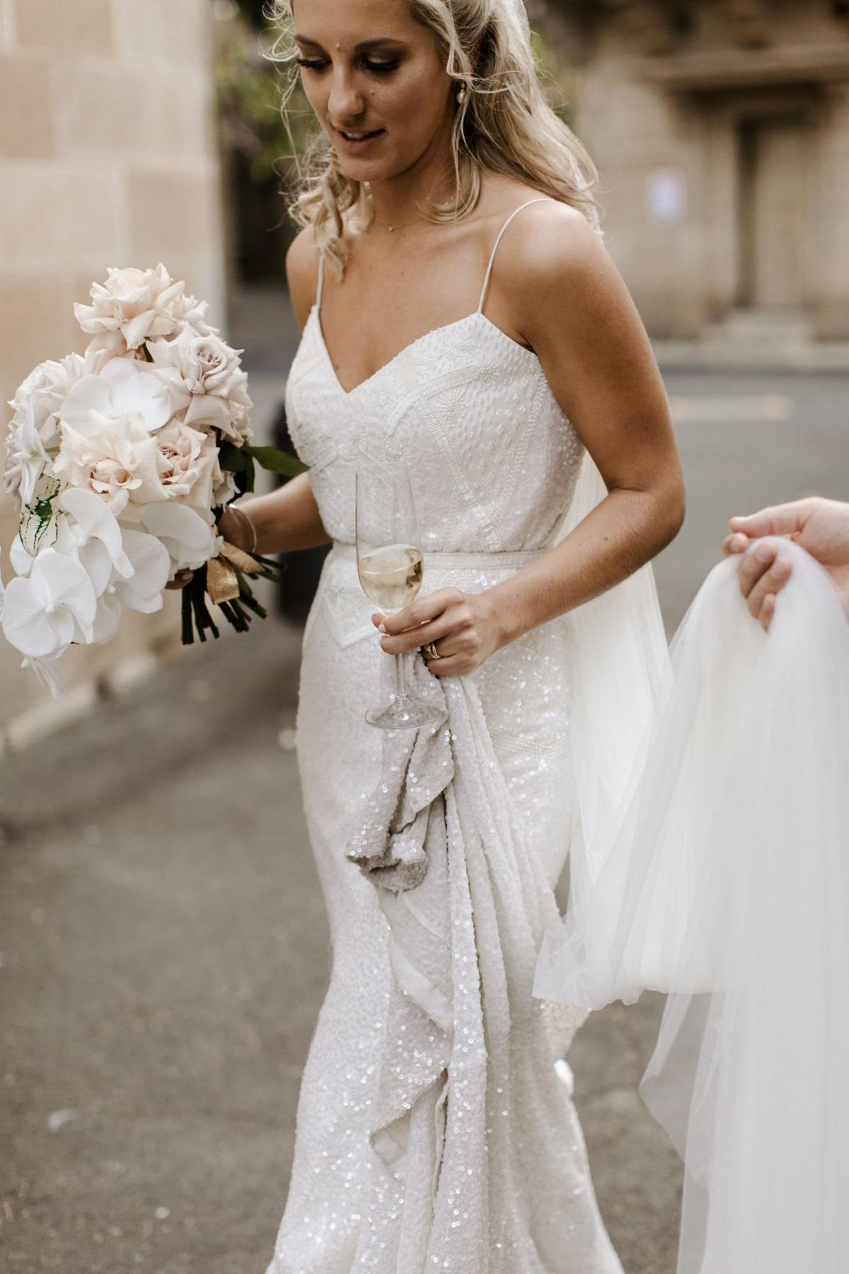 Read all about our real bride's wedding in this blog. She wore the Luxe Addison wedding dress by Karen Willis Holmes.