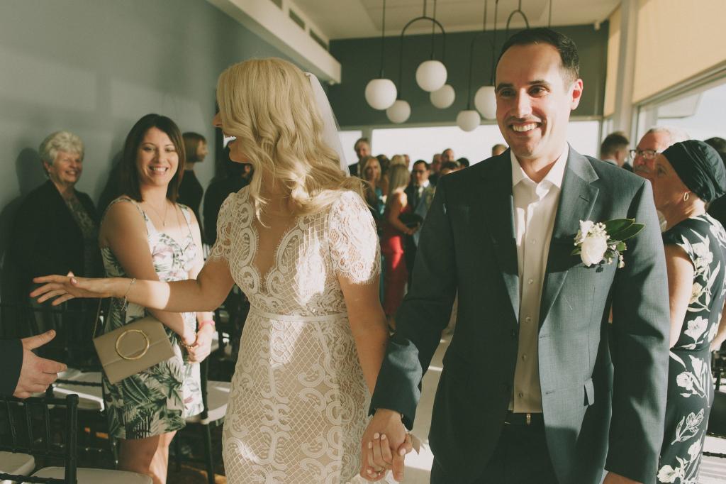 Real bride Sarah wore the Wild Hearts Aisling wedding dress by Karen Willis Holmes.