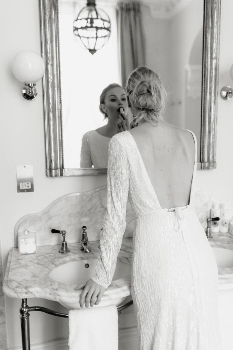 The Margareta gown by Karen Willis Holmes, backless beaded wedding dress.