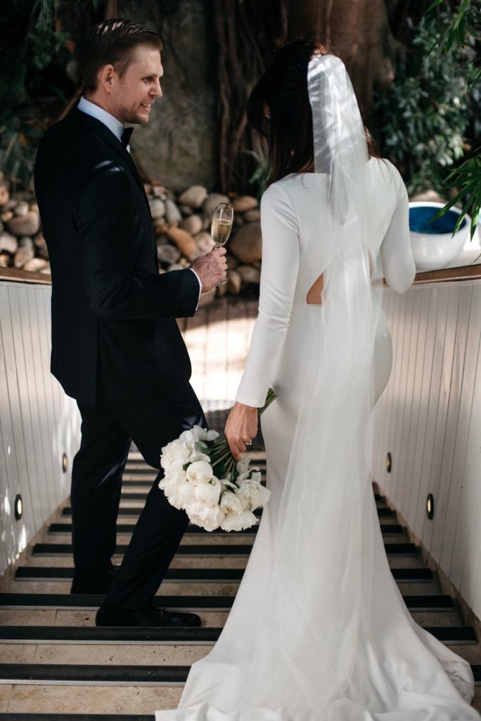 Real bride Tara wore the Wild Hearts Paris wedding dress by Karen Willis Holmes.