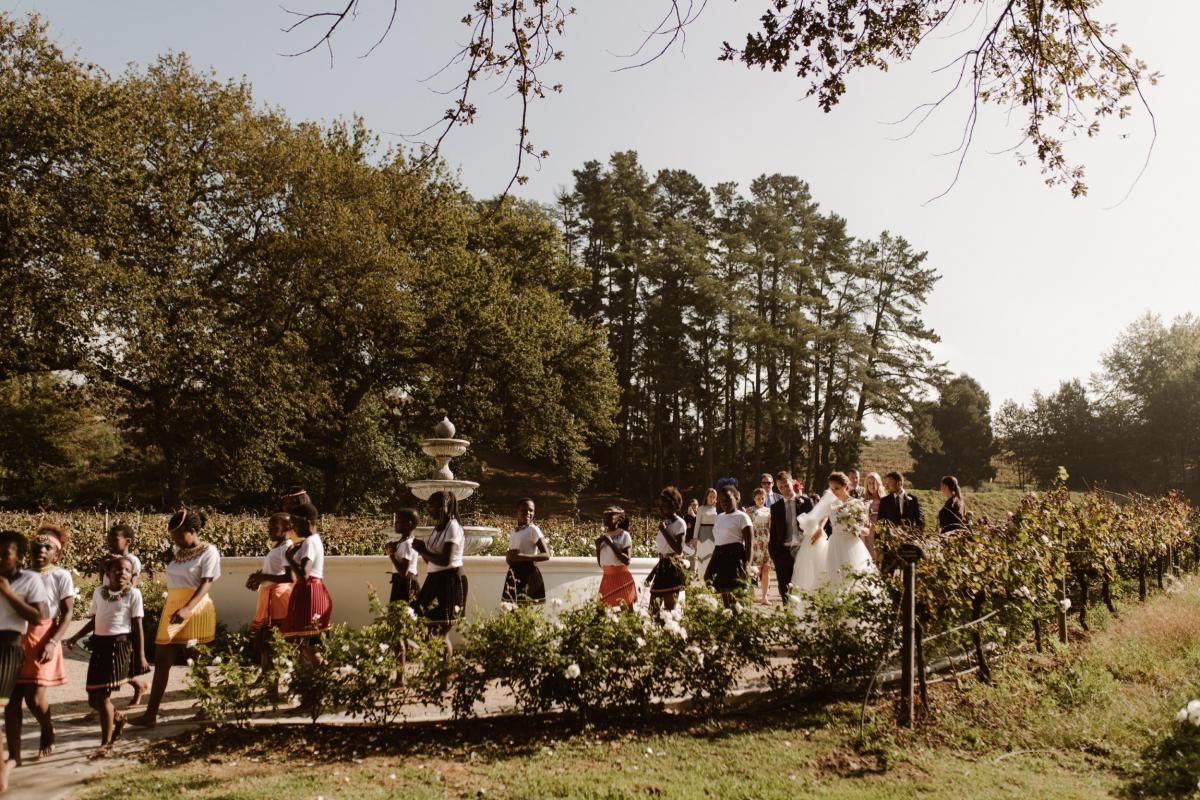 Read all about our real bride's wedding in this blog. She wore the Luxe Roxanna wedding dress by Karen Willis Holmes.