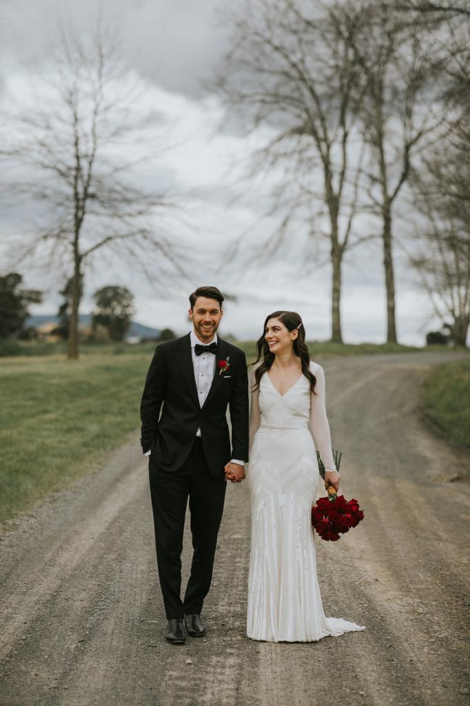 Real bride Louise wore the Luxe Cassie wedding dress by Karen Willis Holmes.