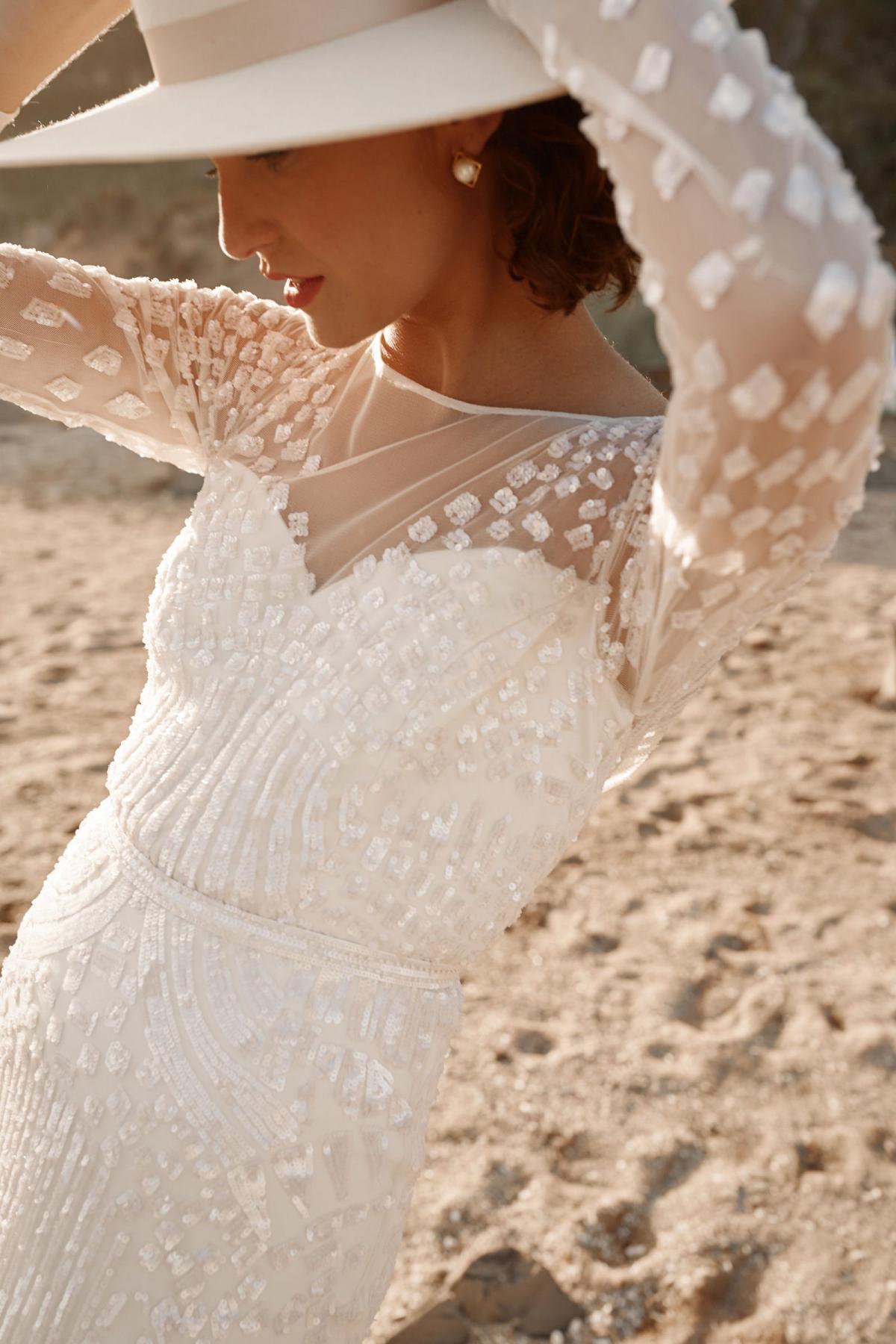 The Lexie gown by Karen Willis Holmes, beaded long sleeve wedding dress.