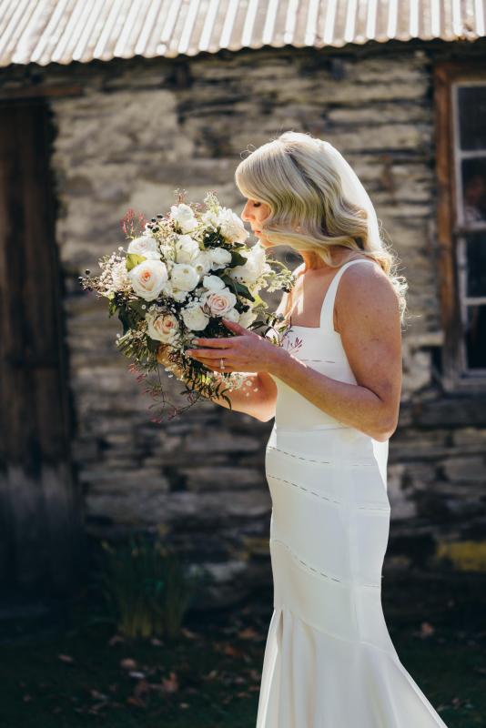 Real bride Megan wore the Wild Hearts Violet wedding dress by Karen Willis Holmes.