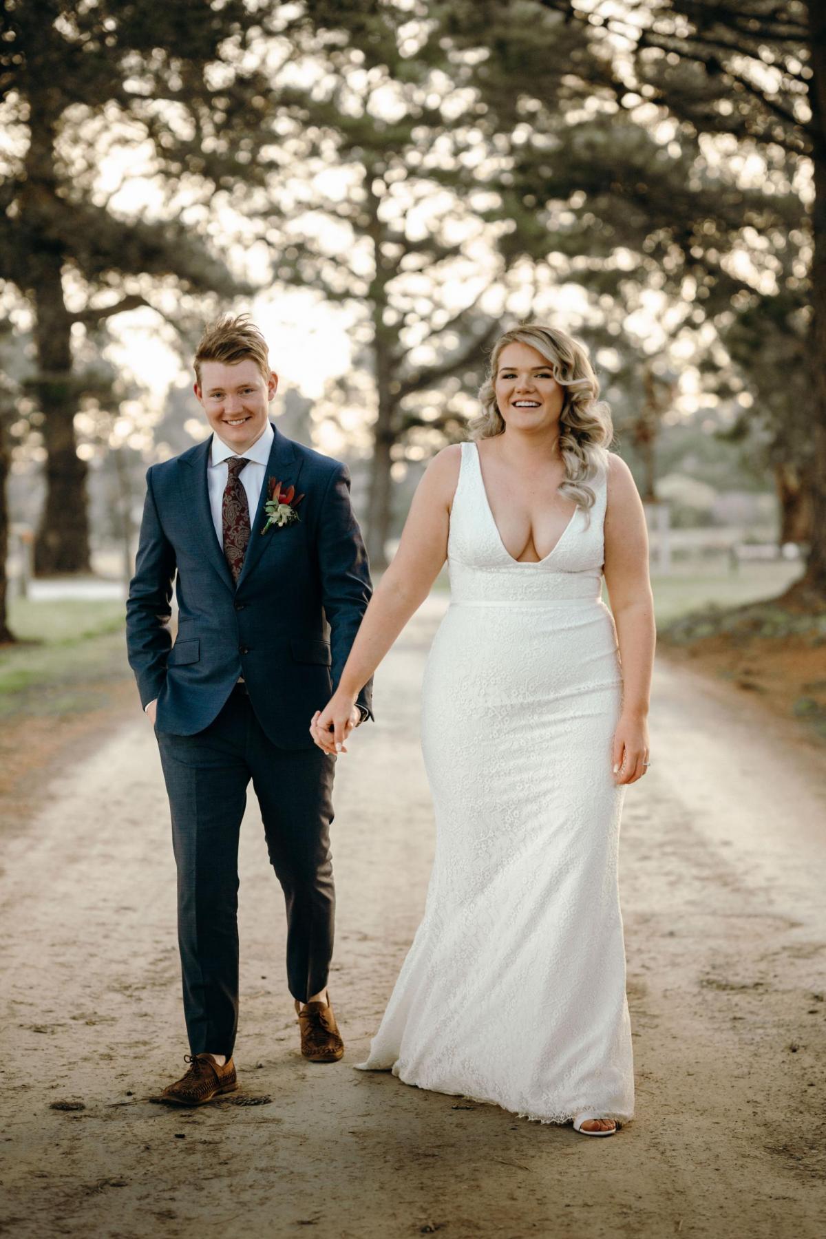Real bride Ally wore the Curve Adina wedding dress by Karen Willis Holmes.