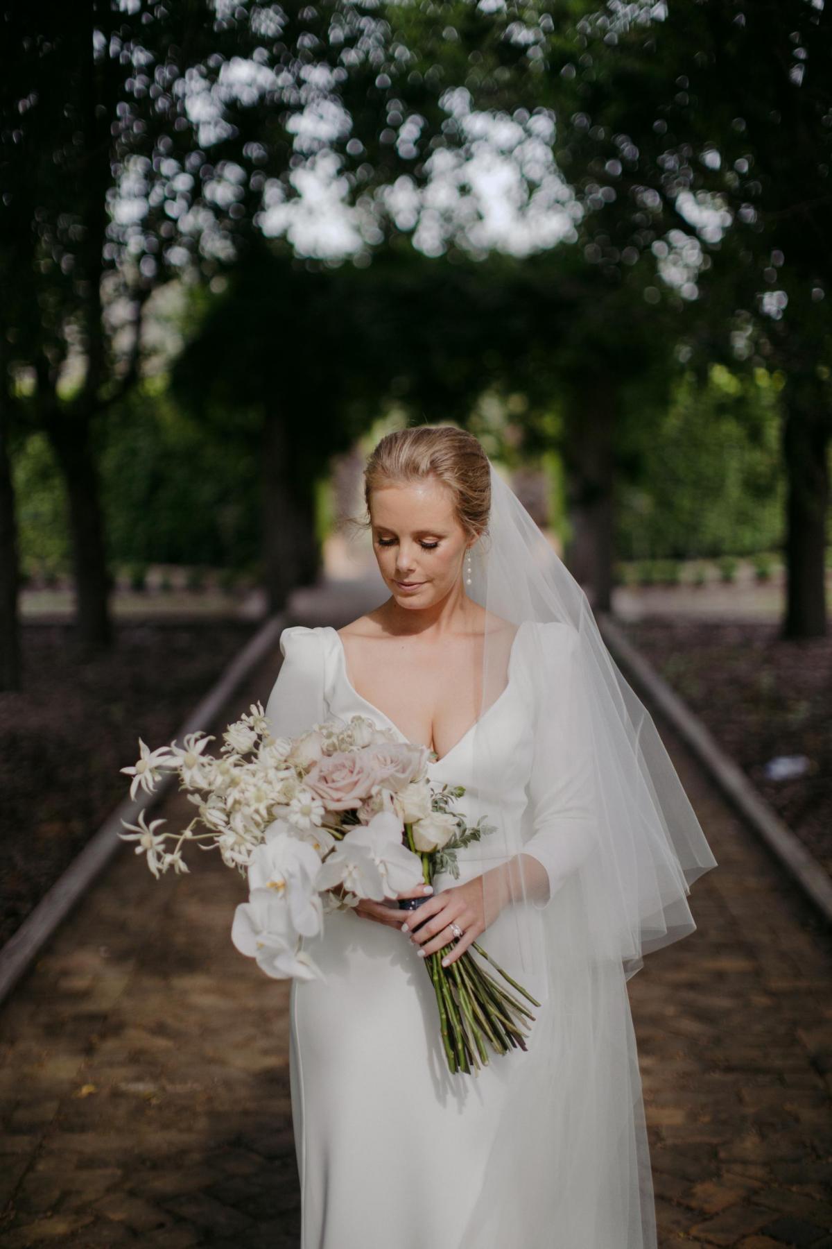 Read all about our real bride's wedding in this blog. She wore the Wild Hearts Aubrey wedding dress by Karen Willis Holmes.