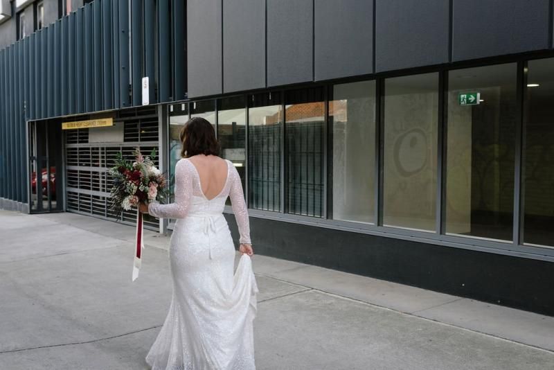 Real bride Jess wore the Luxe Celine wedding dress by Karen Willis Holmes.
