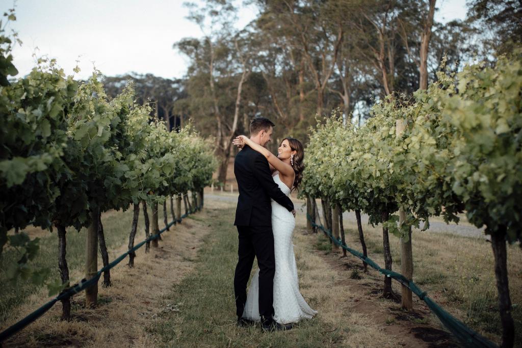 Real bride Rieanna wore the Wild Hearts Elodie wedding dress by Karen Willis Holmes.
