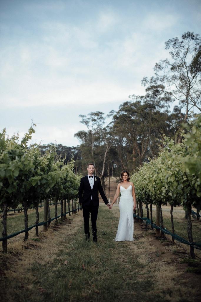 Real bride Rieanna wore the Wild Hearts Elodie wedding dress by Karen Willis Holmes.