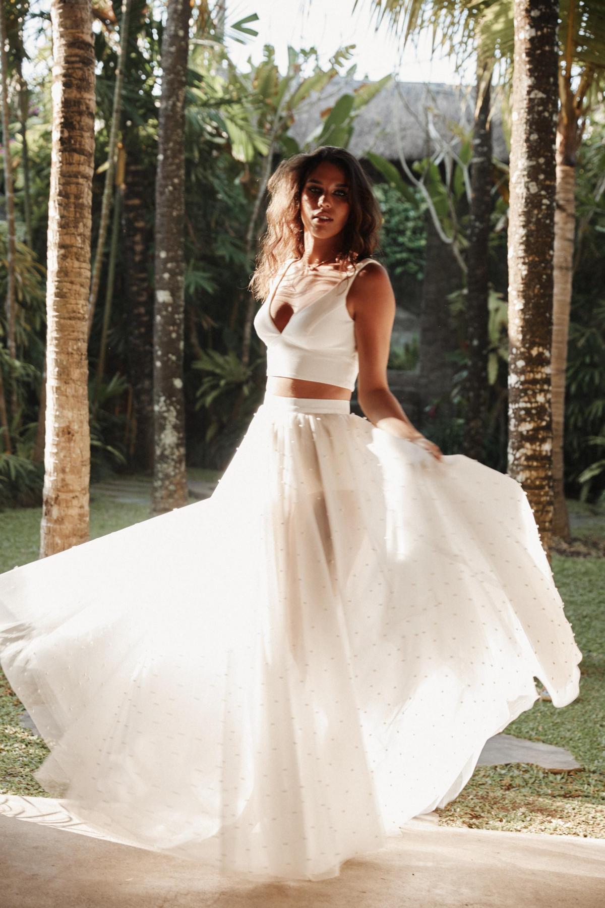 The Erin & Lea two piece wedding dress by Karen Willis Holmes, pearl wedding skirt and bridal crop top.