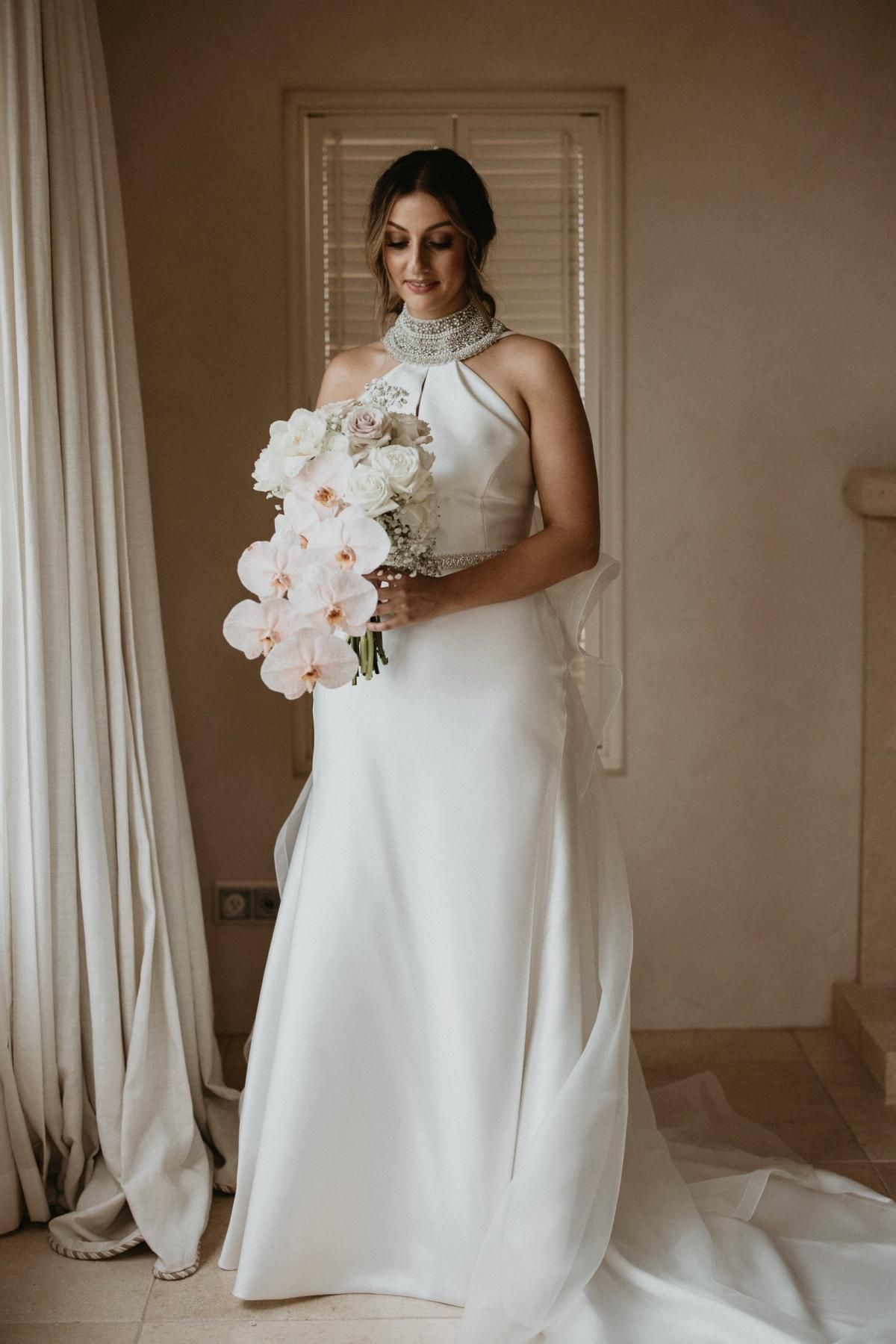 Read all about our real bride's wedding in this blog. She wore the Bespoke Layne wedding dress by Karen Willis Holmes.