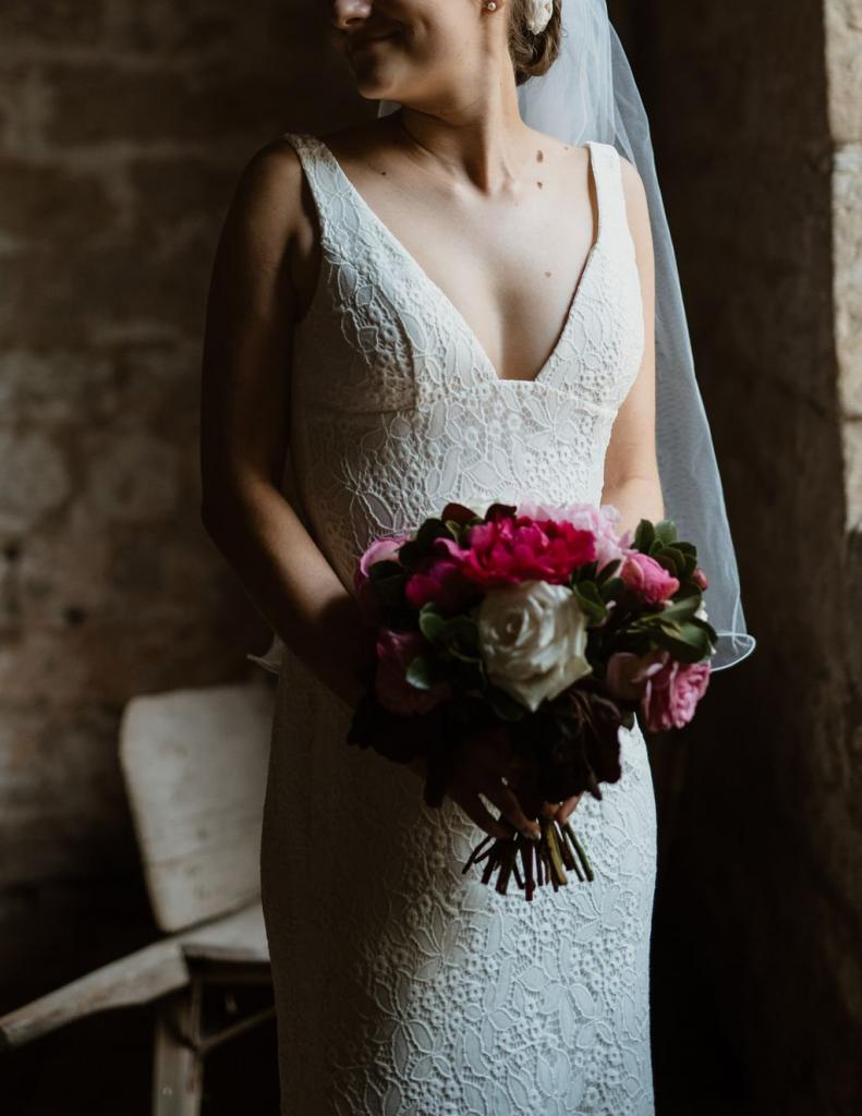 Real bride Alison wore the Wild Hearts Adina wedding dress by Karen Willis Holmes.