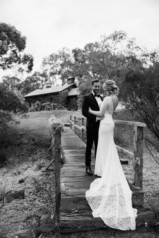 Real bride Nicole wore the Wild Hearts Karina wedding dress by Karen Willis Holmes.