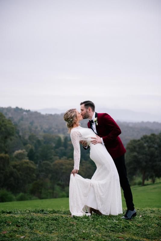 Real bride Nicole wore the Wild Hearts Karina wedding dress by Karen Willis Holmes.