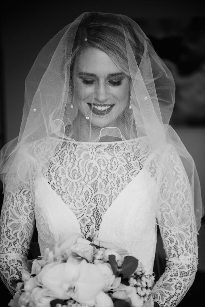 Real bride Nicole wore the Wild Hearts Karina wedding dress by Karen Willis Holmes.