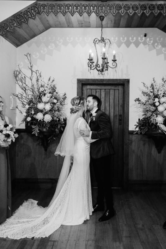 Real bride Nicole wore the Wild Hearts Karina wedding dress by Karen Willis Holmes.