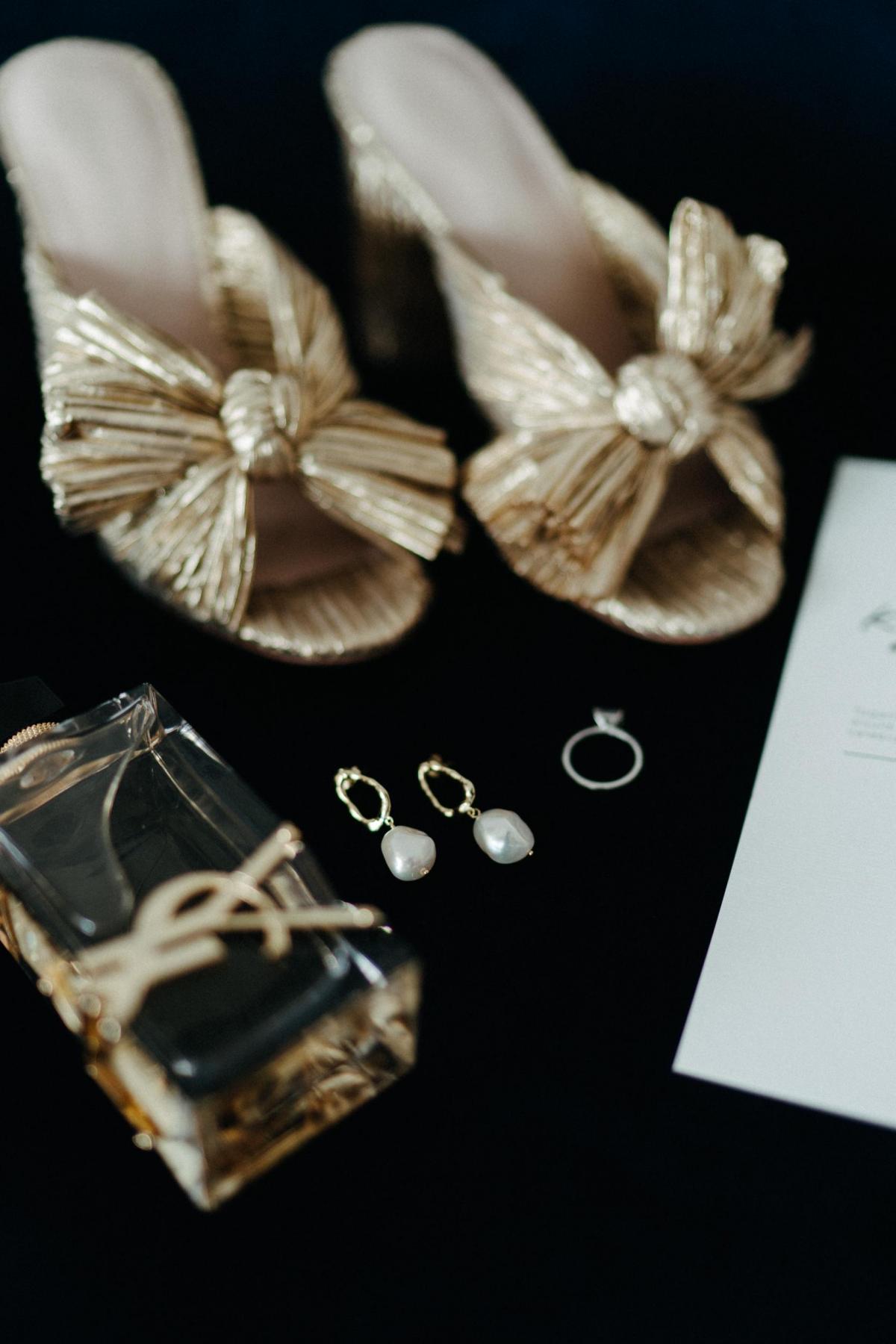 KWH bride Kate's wedding accessories; earrings, heels, ring, and parfum.