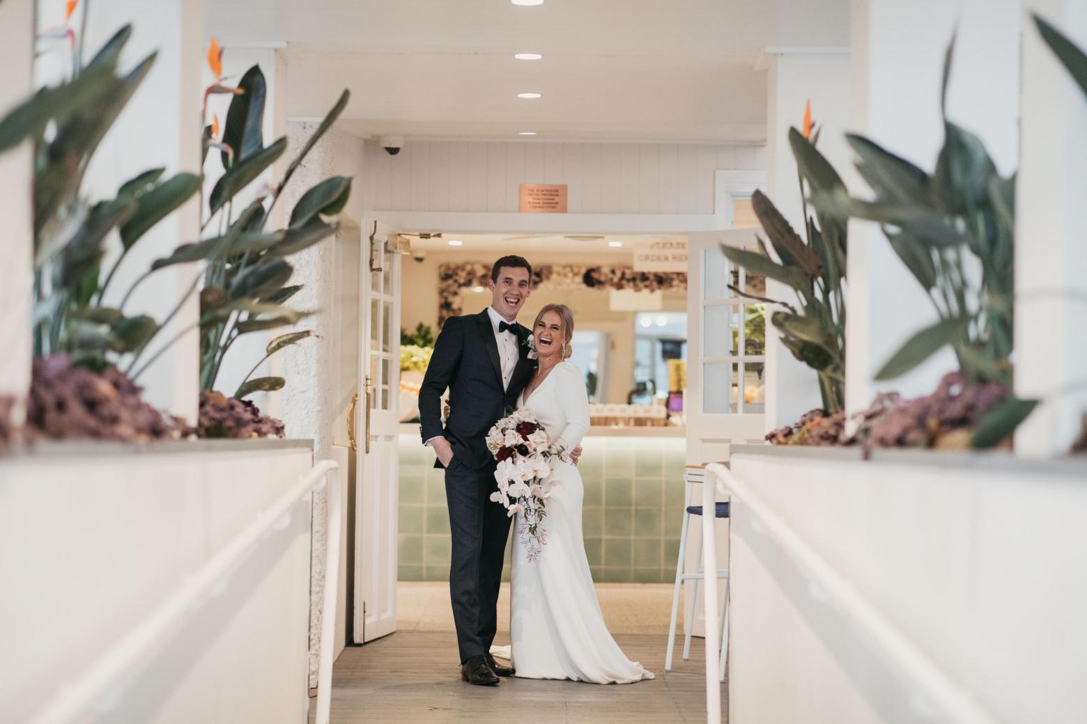 Jordana & Mitch just married; featuring the AUBREY gown by Karen Willis Holmes.