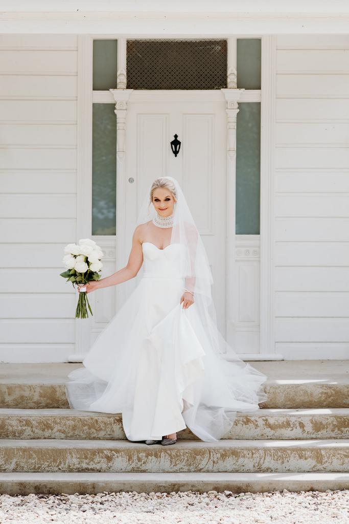 Real bride Bess wore the Bespoke Blake/Prea wedding dress by Karen Willis Holmes.