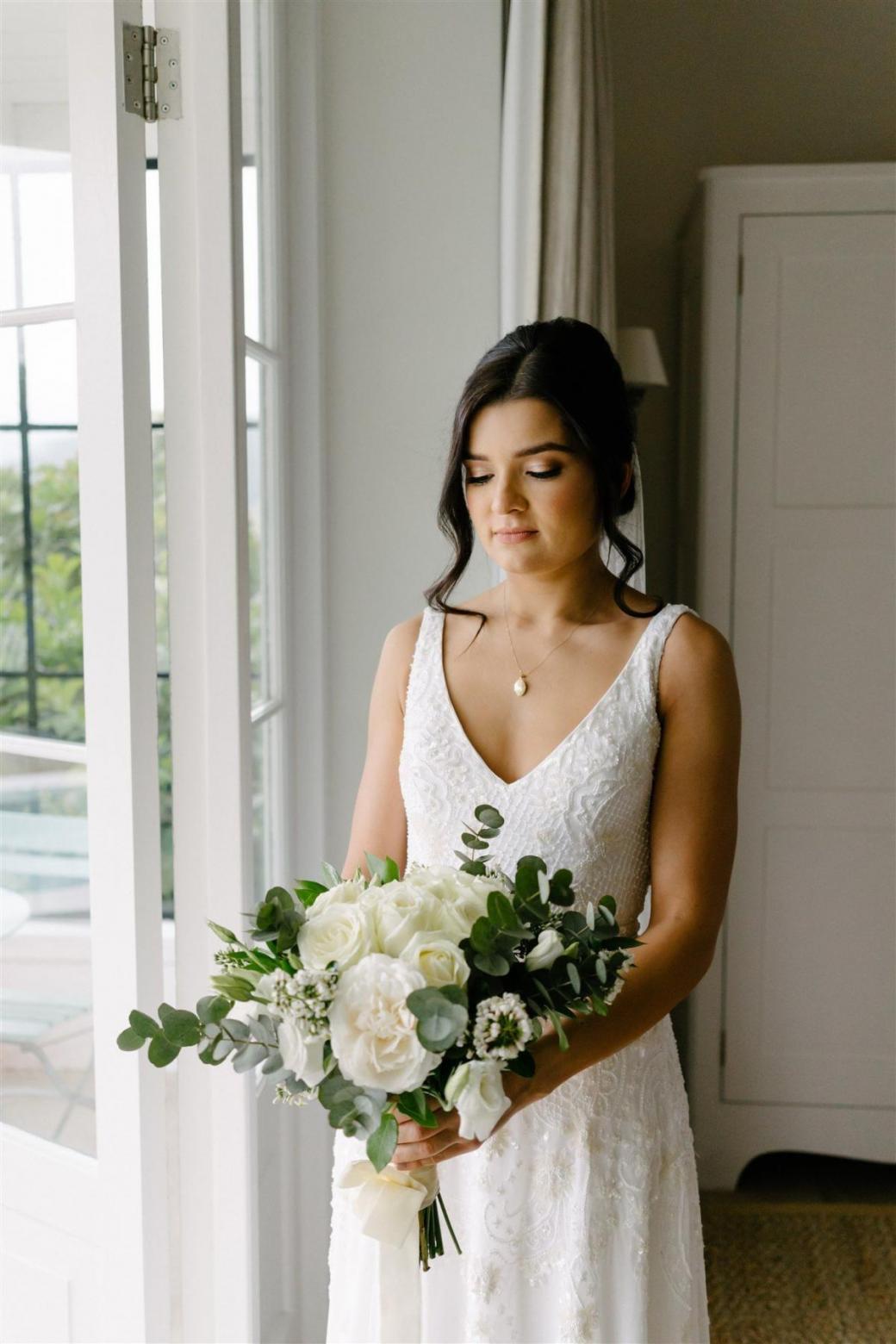 Real bride Jess wore the Luxe Beatrice wedding dress by Karen Willis Holmes.