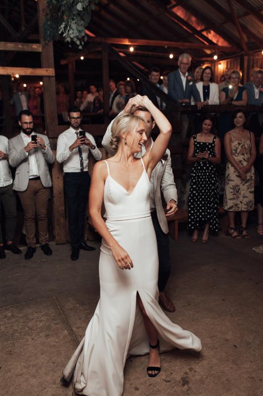 Real bride Lauren wore the Wild Hearts Caroline wedding dress by Karen Willis Holmes.