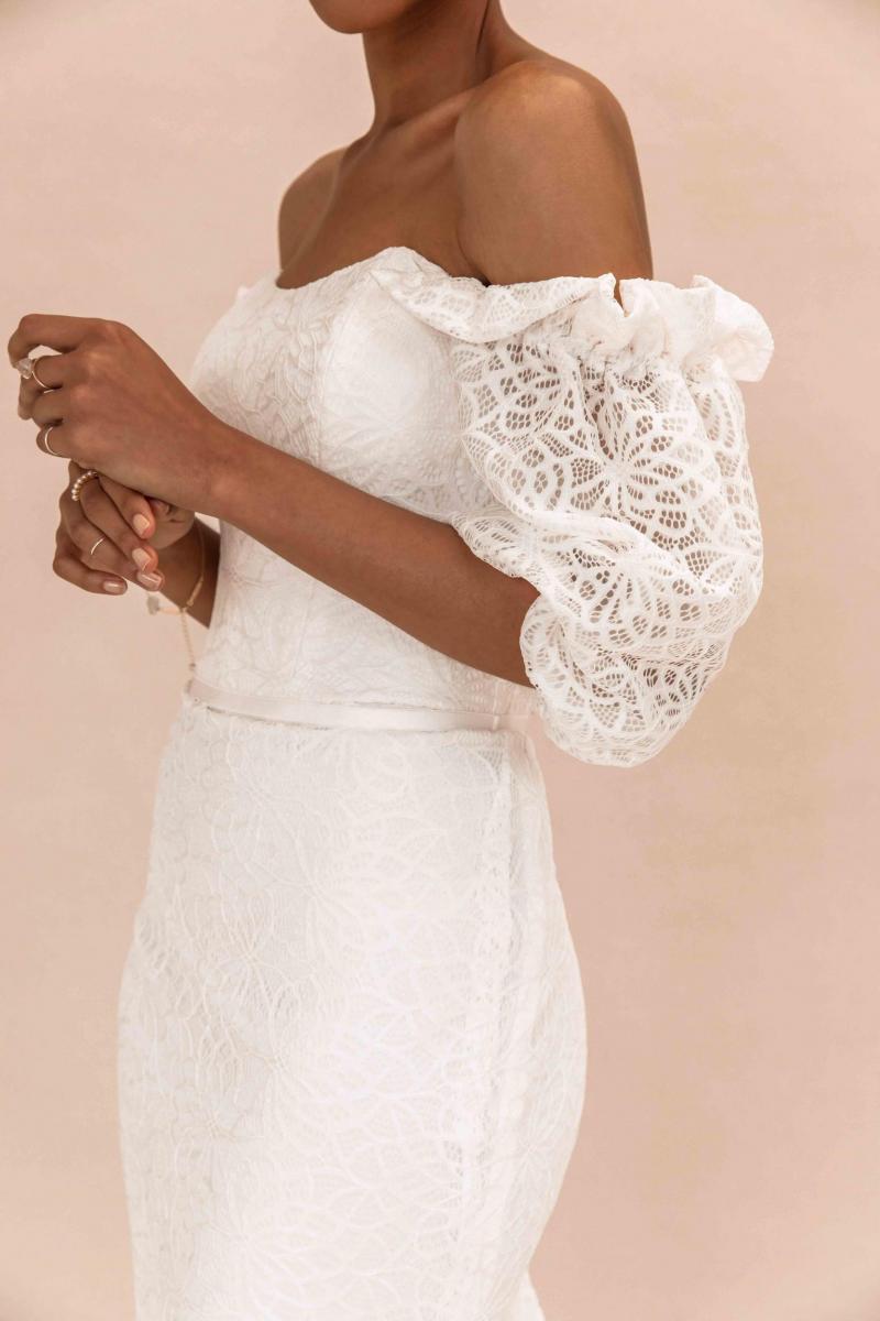 The Vivienne gown by Karen Willis Holmes, sweetheart lace wedding dress with puffy sleeves.