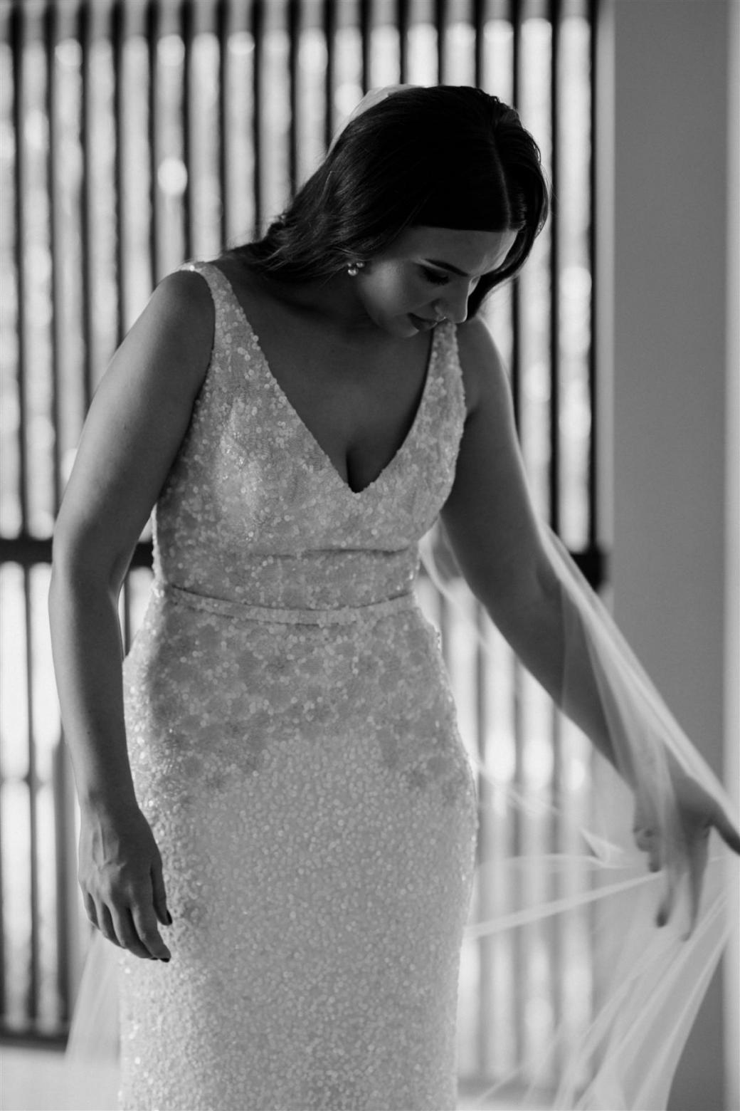 KWH bride Jemma getting ready wearing GEORGINA wedding dress; a beaded dress with a designed fit and flare