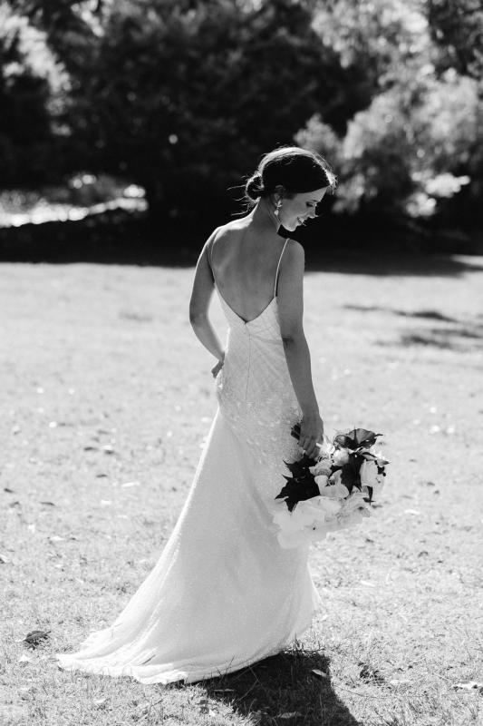 Real bride Emma wore the Luxe Darcy wedding dress by Karen Willis Holmes.