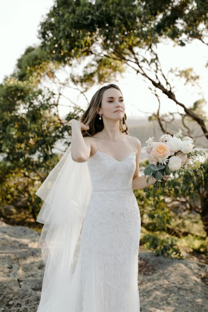 Real bride Georgia wore the Luxe Freya wedding dress by Karen Willis Holmes.