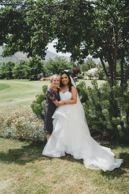 Real bride Jessica wore the Wild Hearts Greta wedding dress by Karen Willis Holmes.