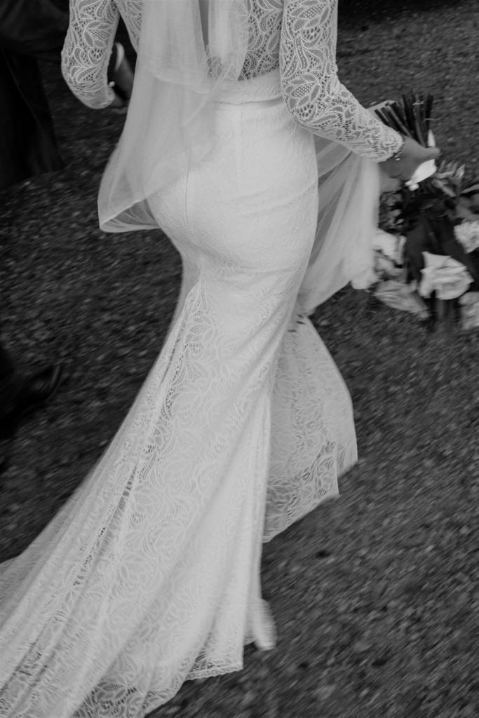 Real bride Charlotte wore the Wild Hearts Jemma wedding dress by Karen Willis Holmes.