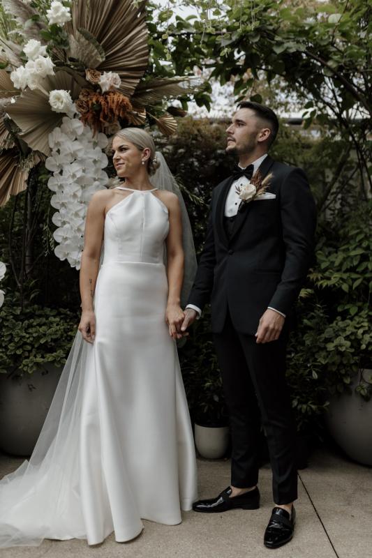 Real bride Natalie wore the Bespoke Layne wedding dress by Karen Willis Holmes.