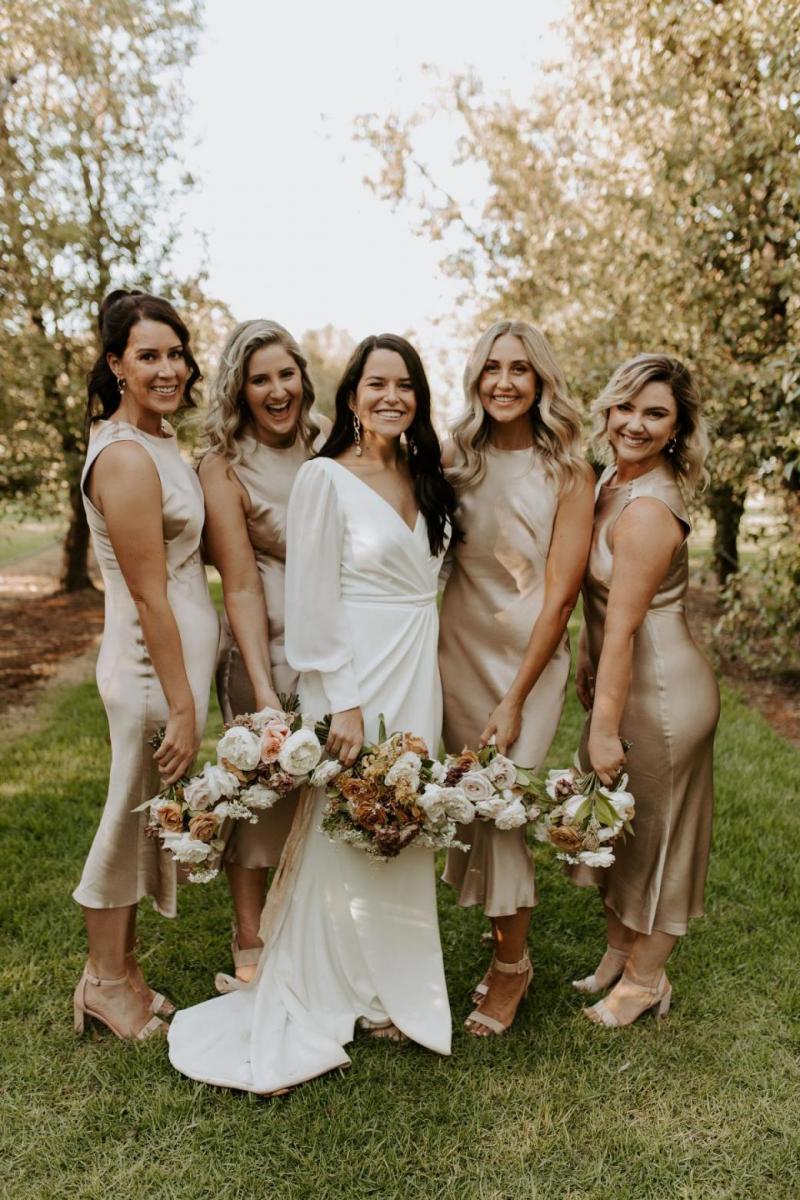 Real bride Rahni wore the Wild Hearts Nikki wedding dress by Karen Willis Holmes.