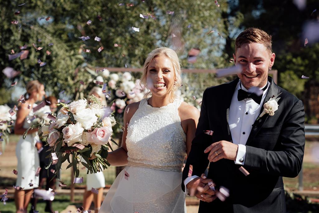 Real bride Laura wore the Luxe Cindy wedding dress by Karen Willis Holmes.