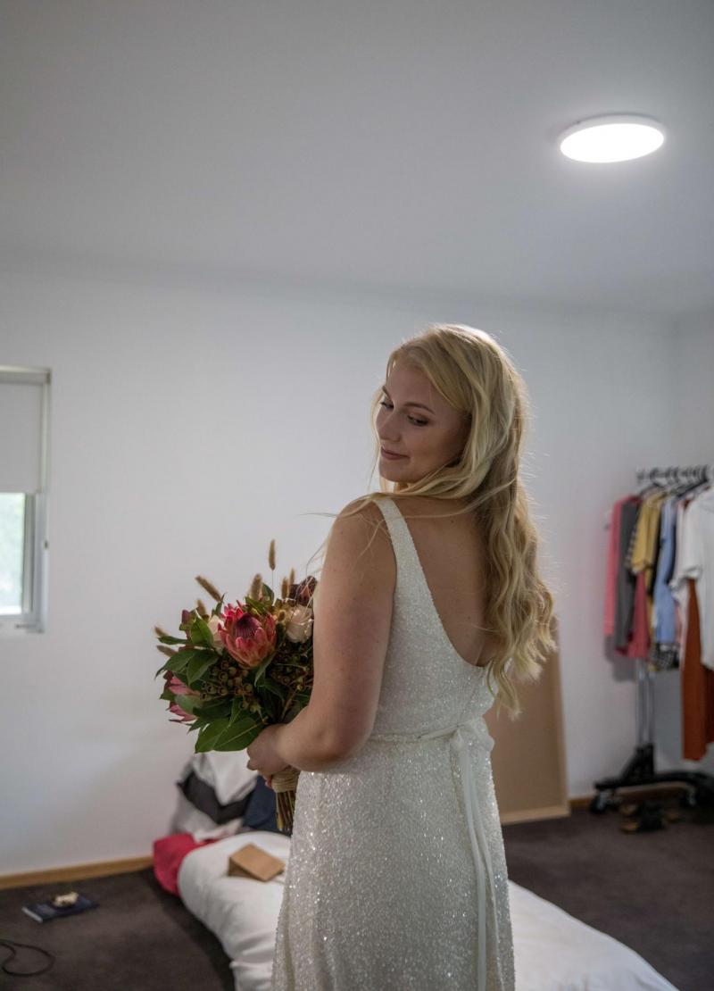 KWH bride getting ready for her COVID-19 wedding